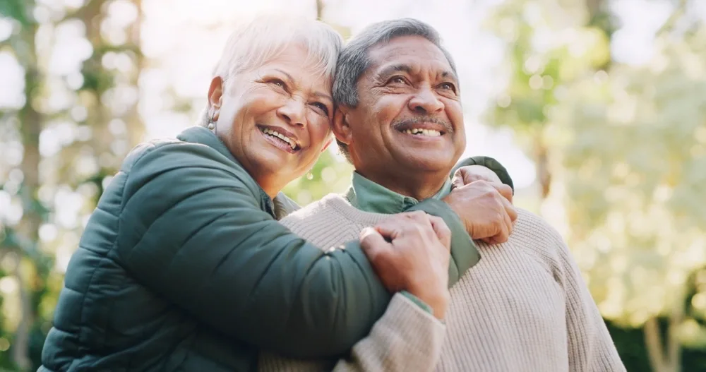 Smiling older couple outdoors